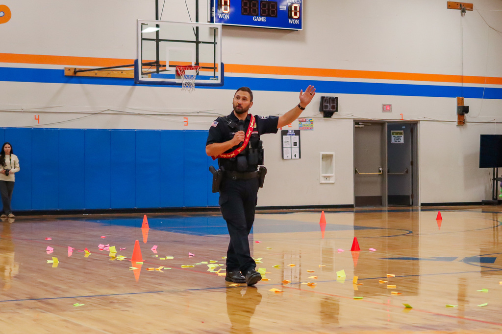 Officer Lemon speaking with students