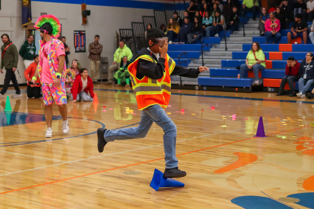 student participating in relay race