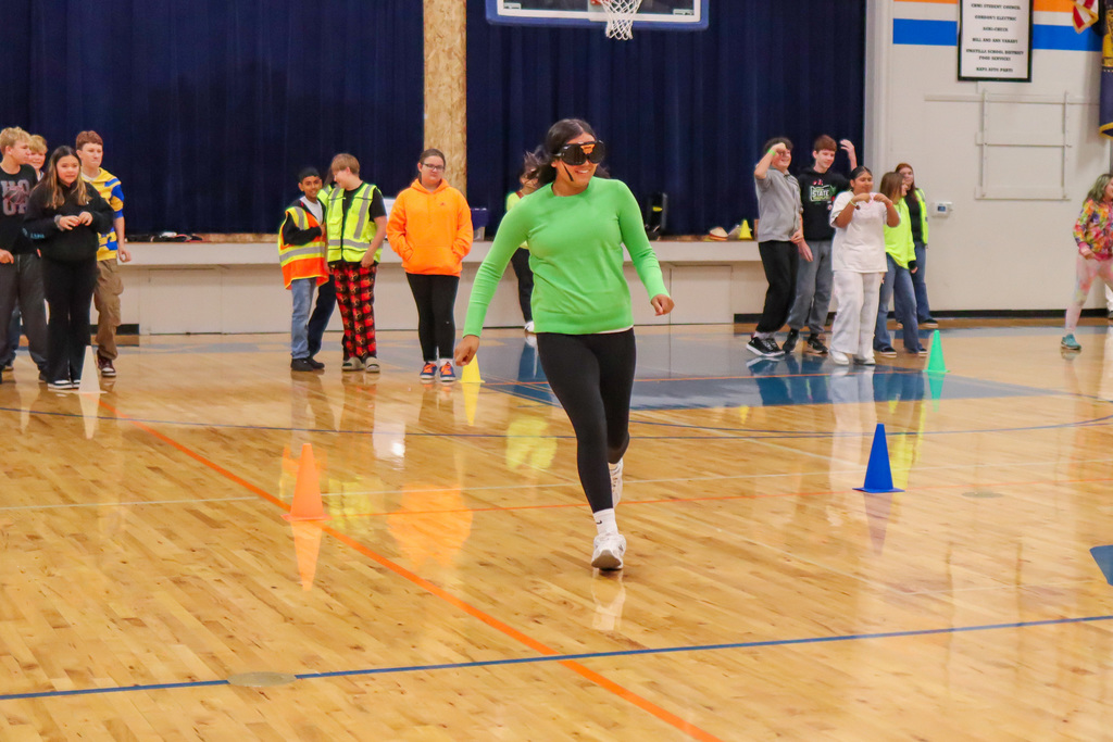 student participating in relay race