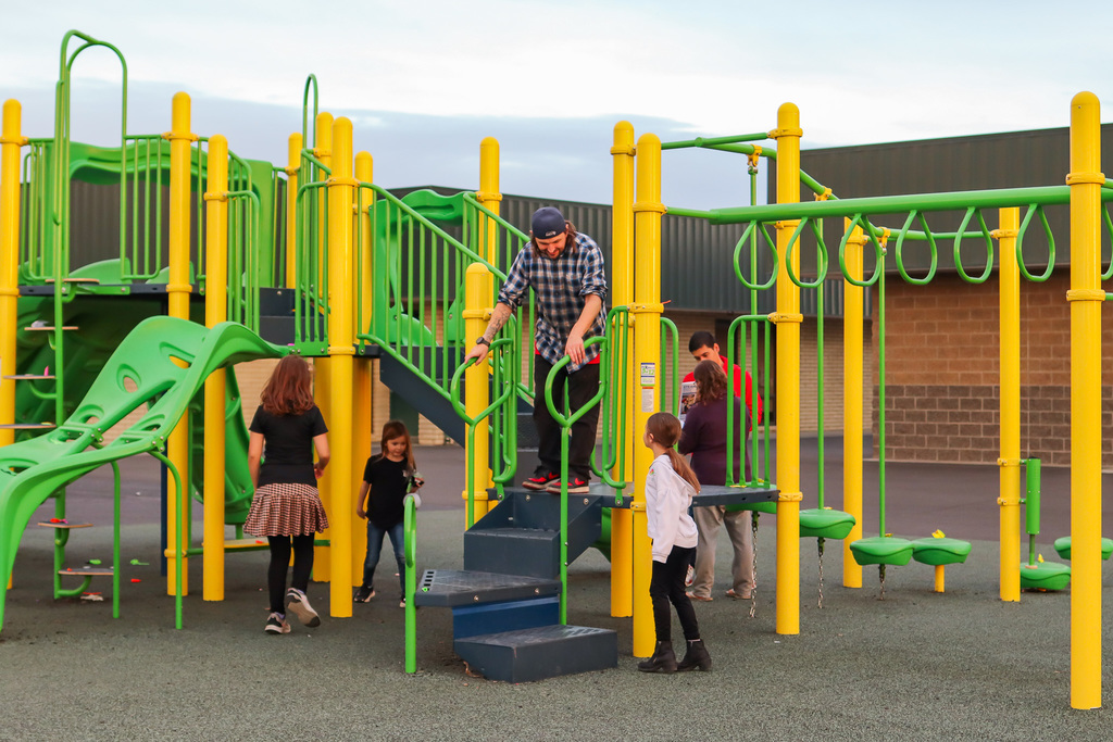 students and families participating in scavenger hunt