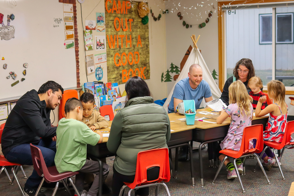 students and families working on project