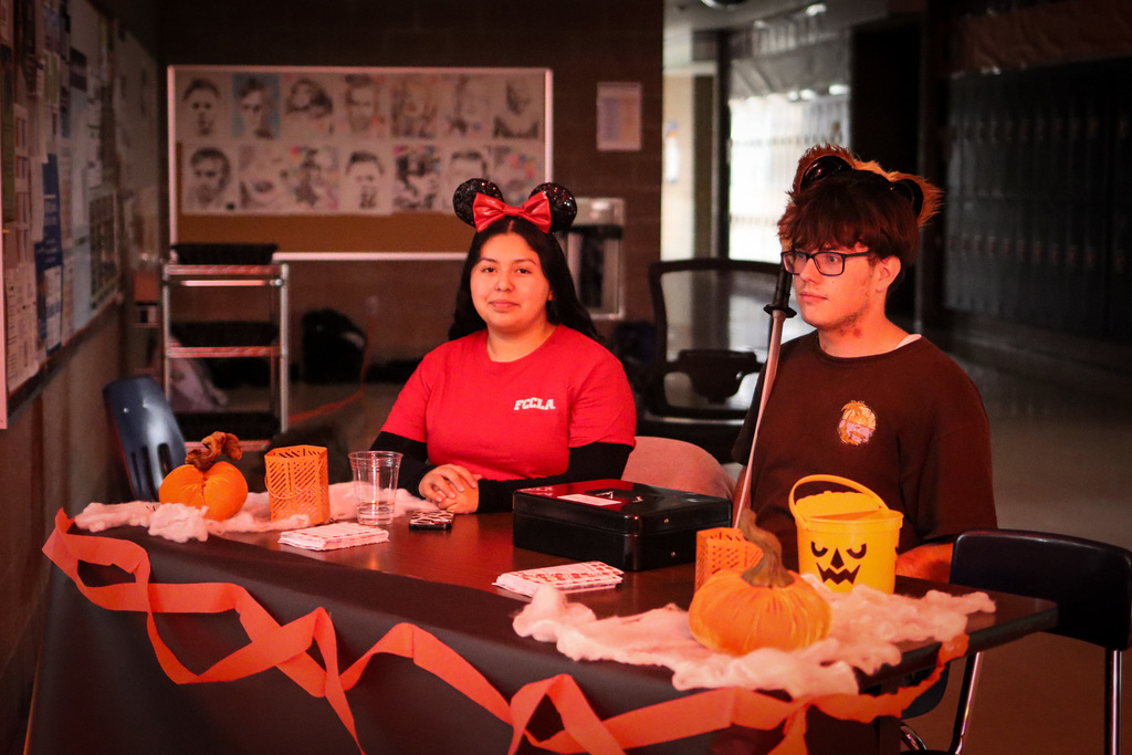 photo of high school students who are at the ticket table 