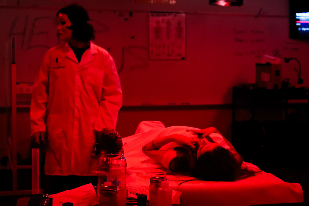 photo of students in character waiting to scare families 