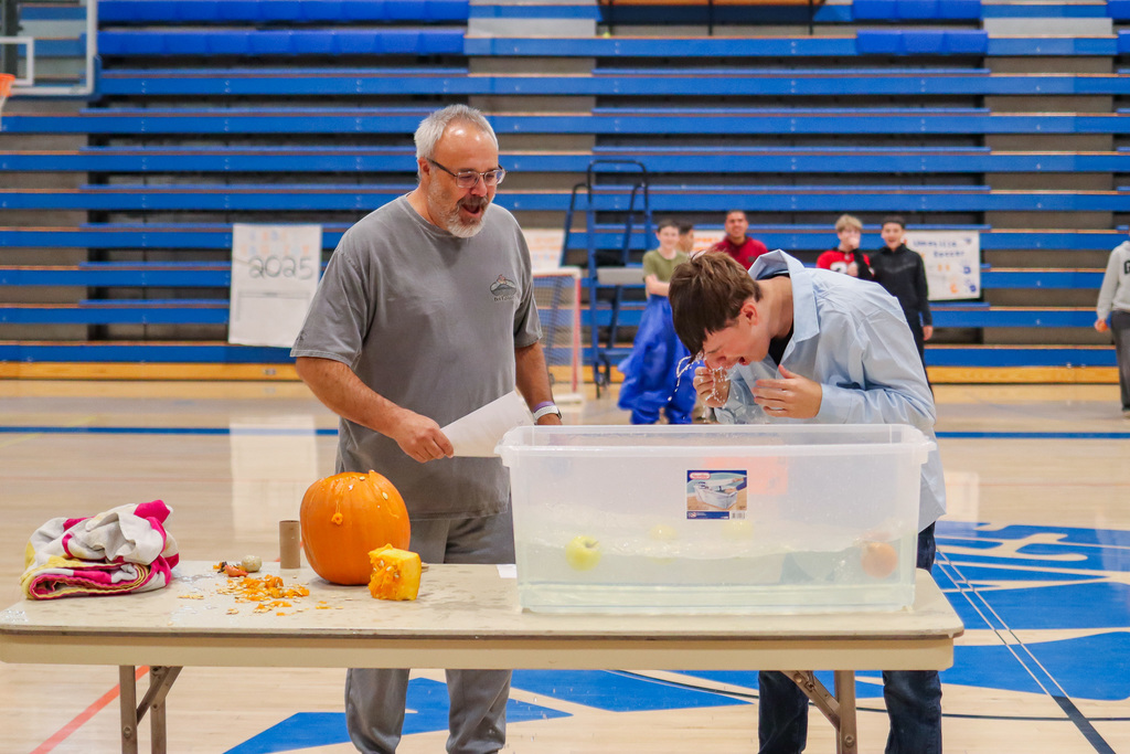 photo of students participating in assembly game