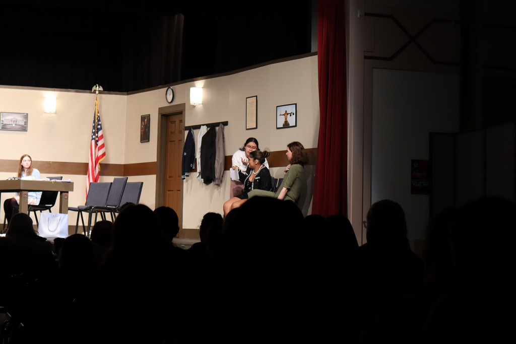 students performing in the play 