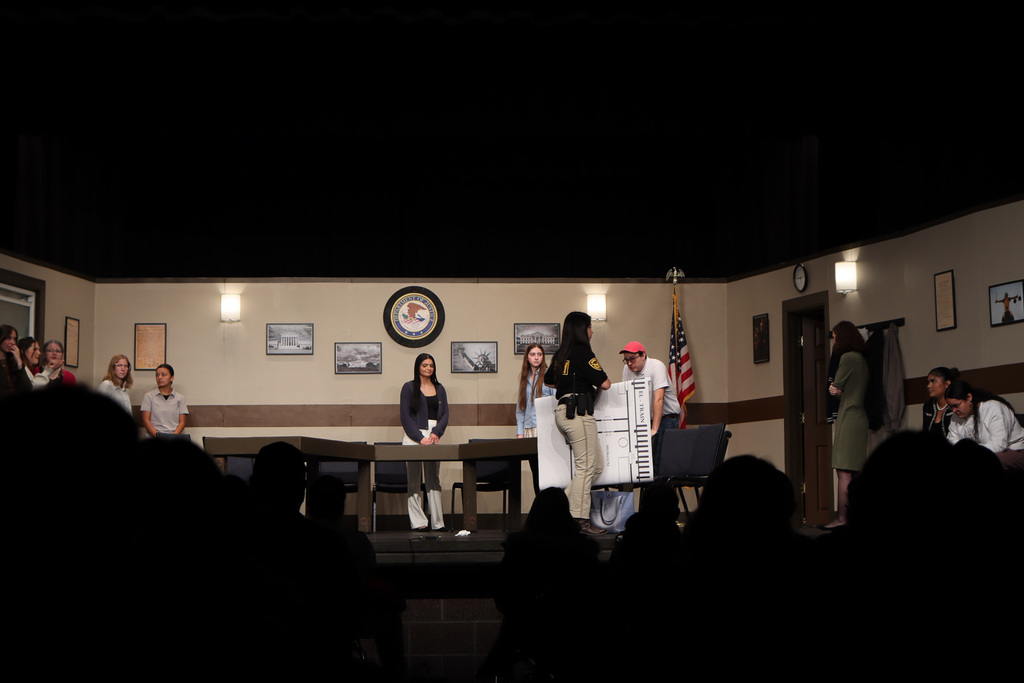 students performing in the play 