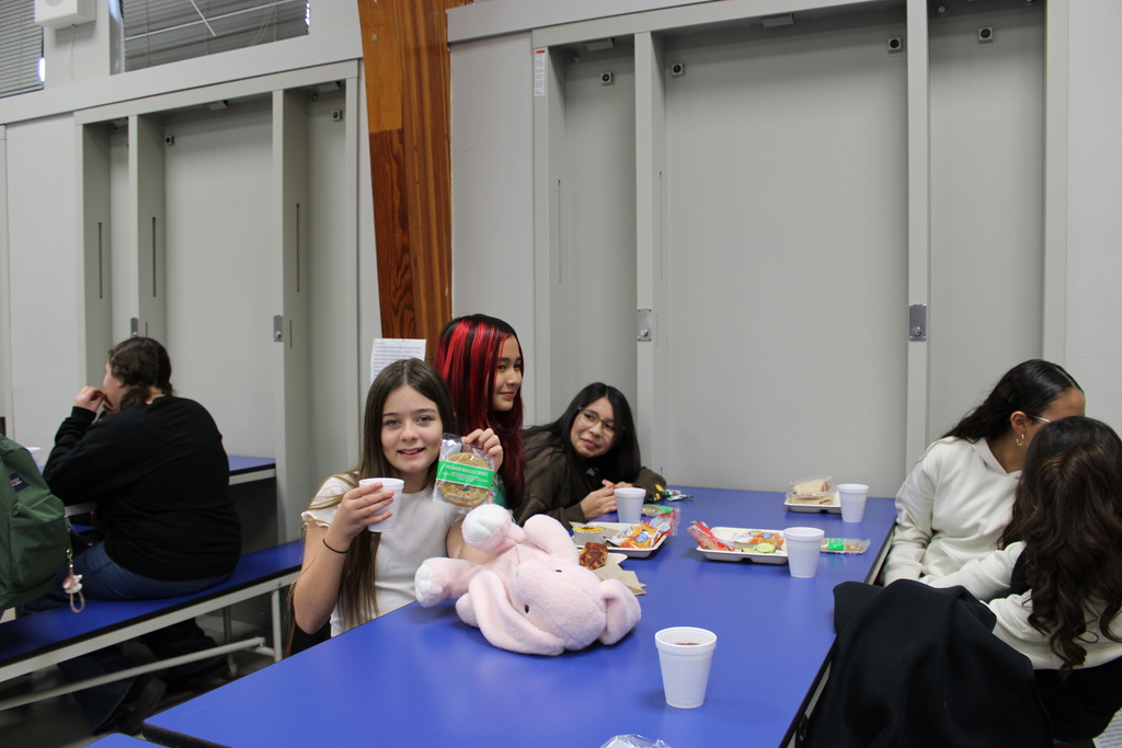 students enjoying cookies and hot chocolate 