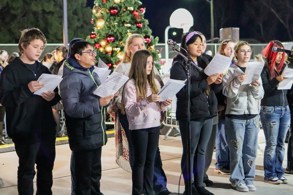photo of middle school students singing