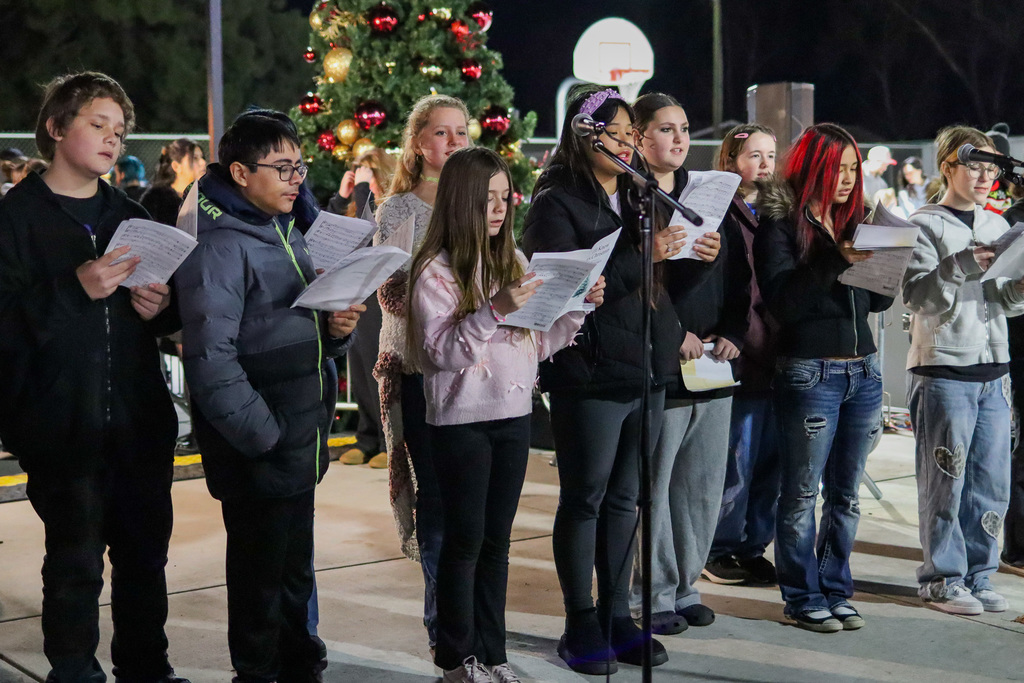 photo of middle school students singing