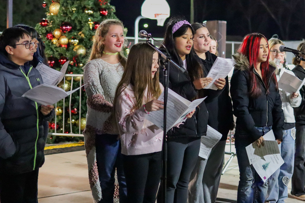 photo of middle school students singing