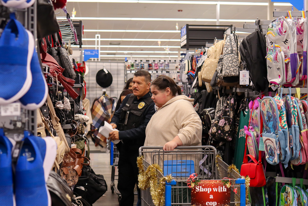 police officer and student shopping 