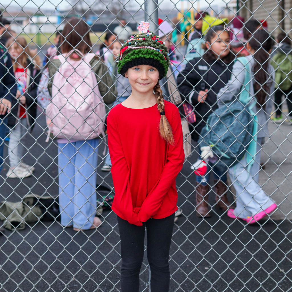 MHES student wearing a Holiday Head Gear
