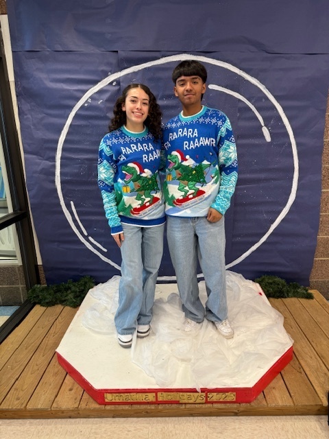 photo of students in matching sweater 