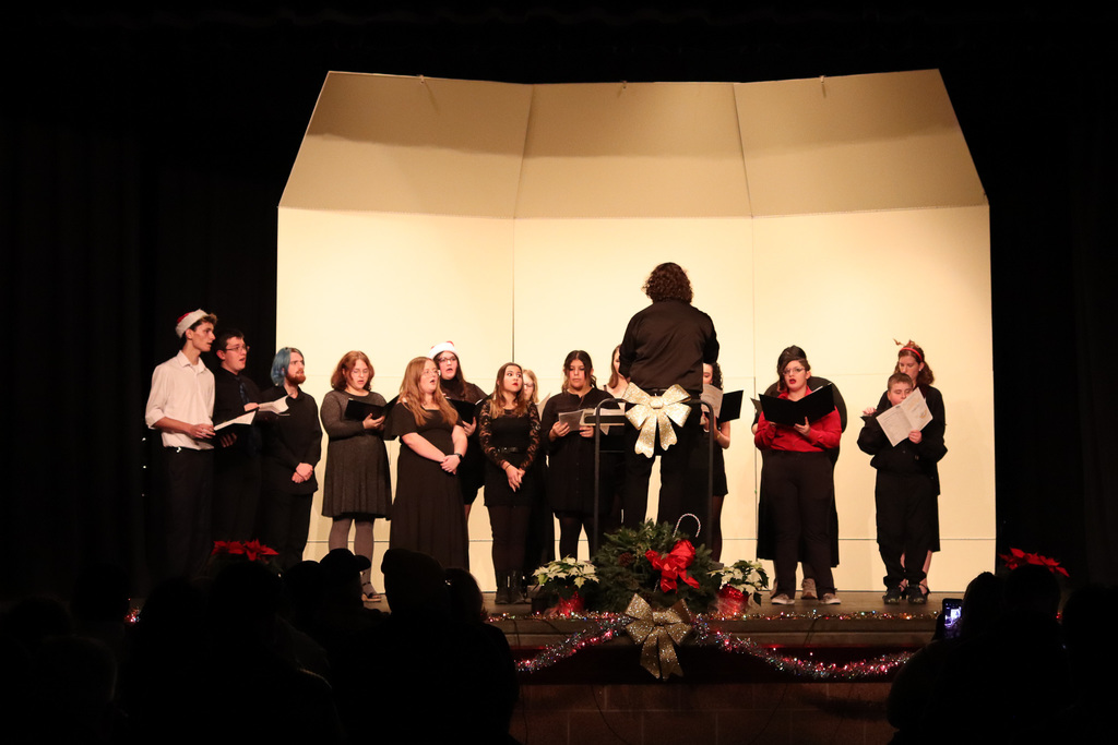 photo of high school choir students singing 