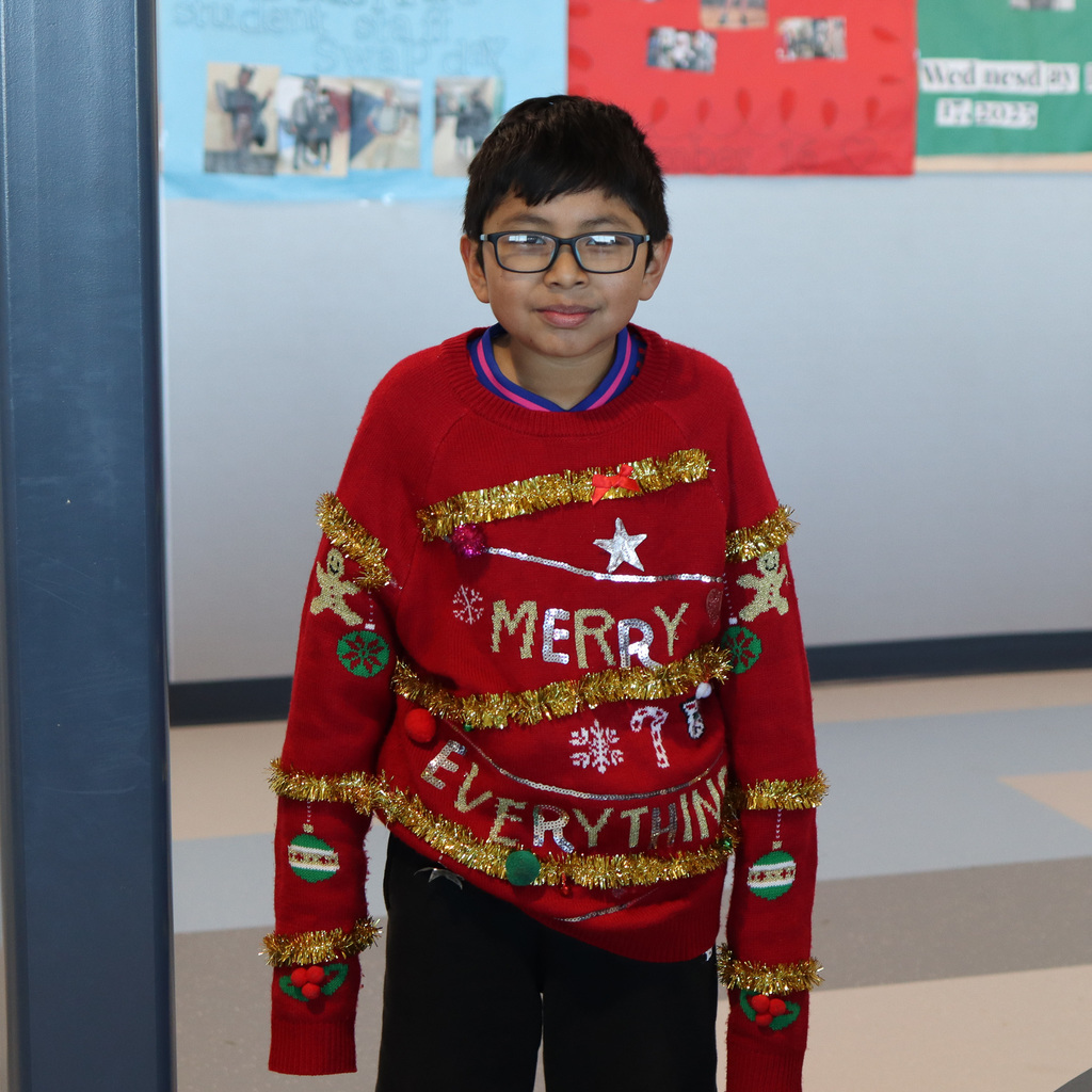 CVI student wearing festive sweater