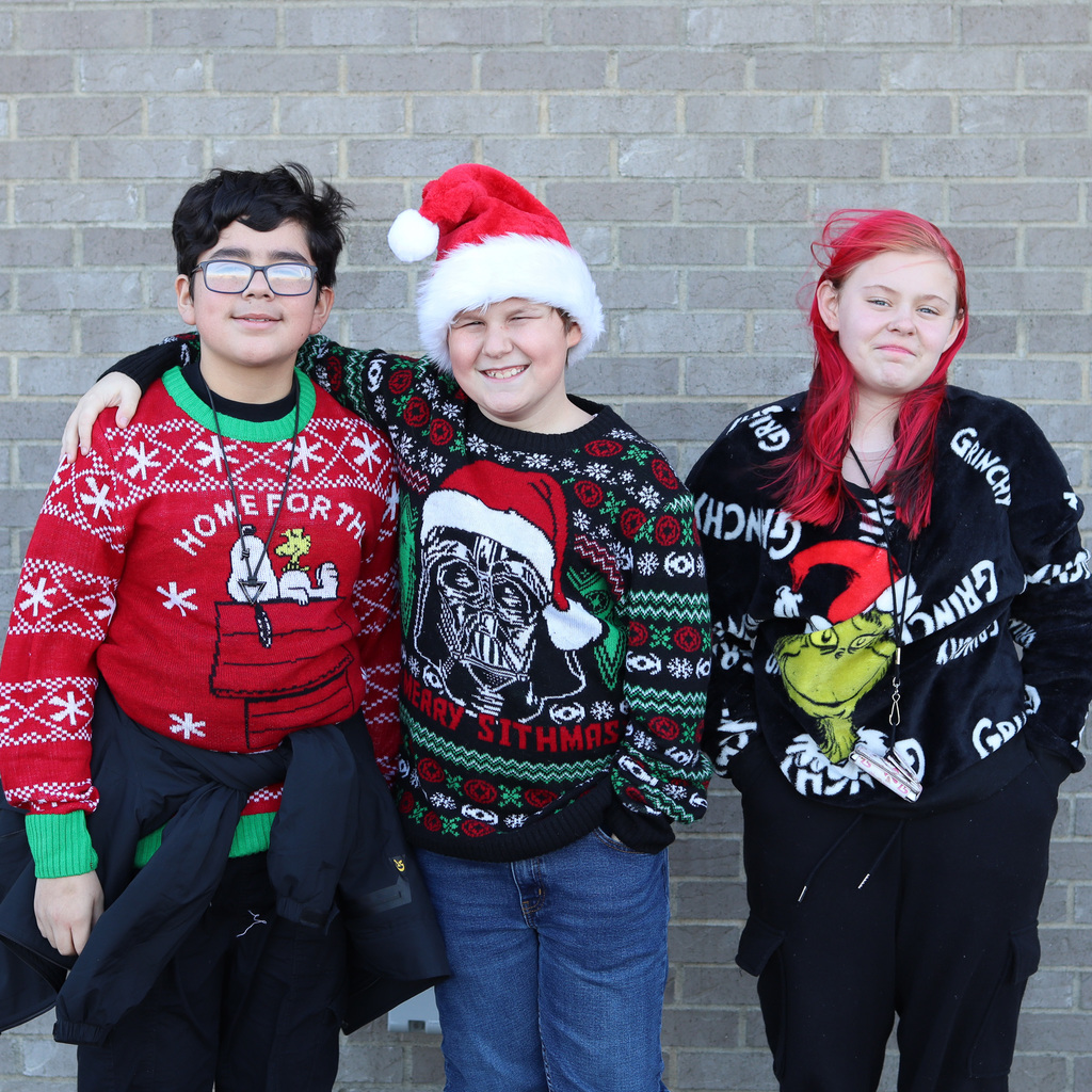 CVI students wearing festive sweaters