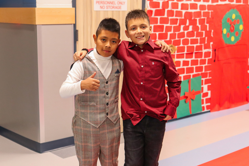 students taking a photo on the red carpet 