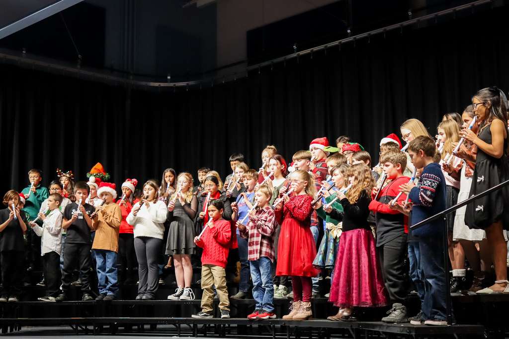 students playing the recorders 