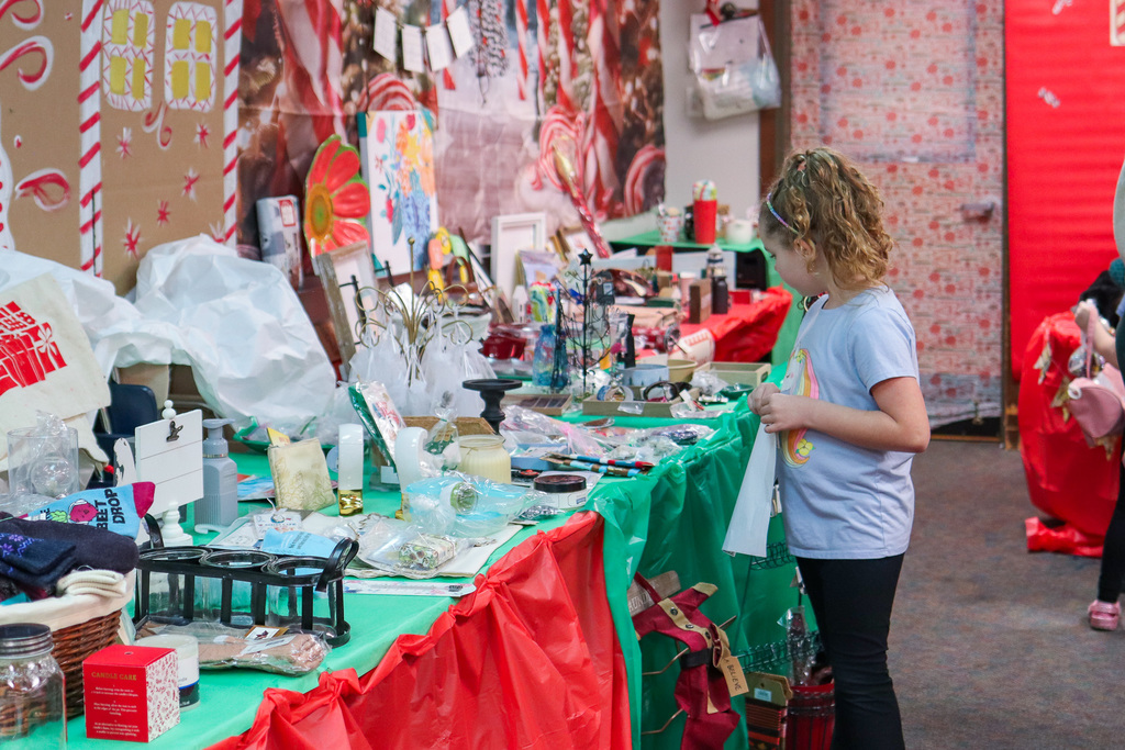 students picking out gifts at the Little Angel Shop