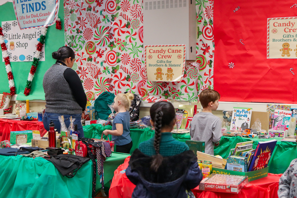 students picking out gifts at the Little Angel Shop
