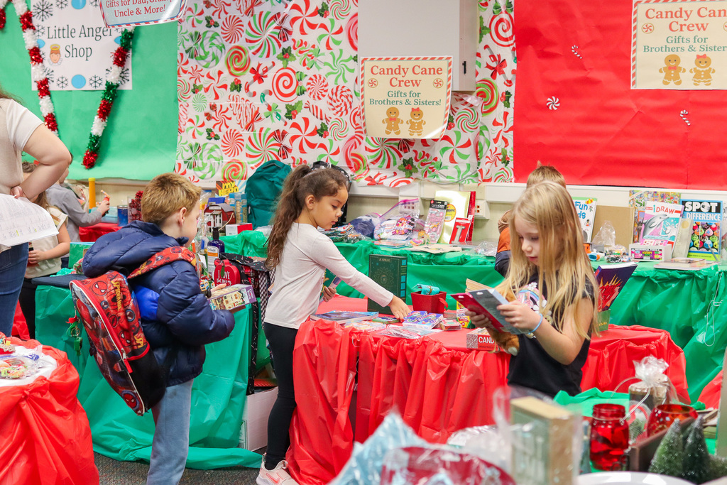 students picking out gifts at the Little Angel Shop