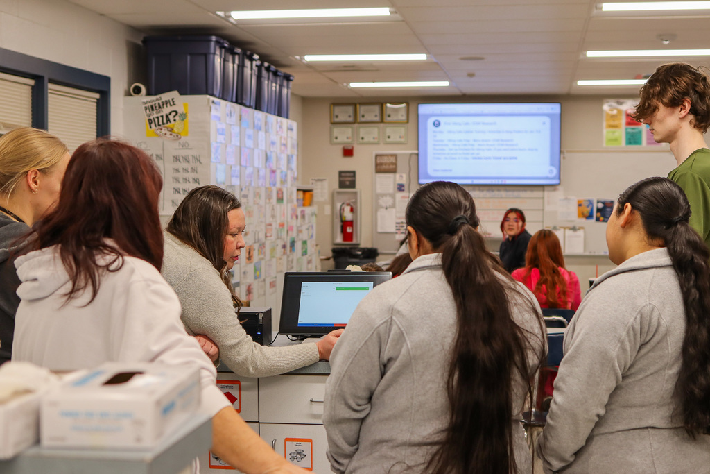 students training on the new point of sale system 