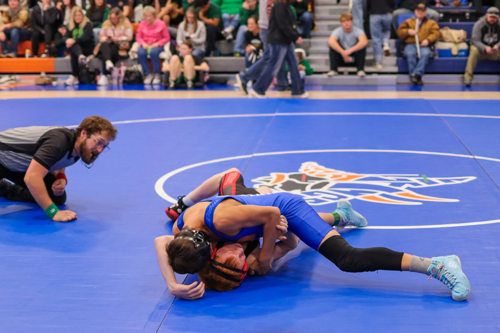 photo of athletes wrestling