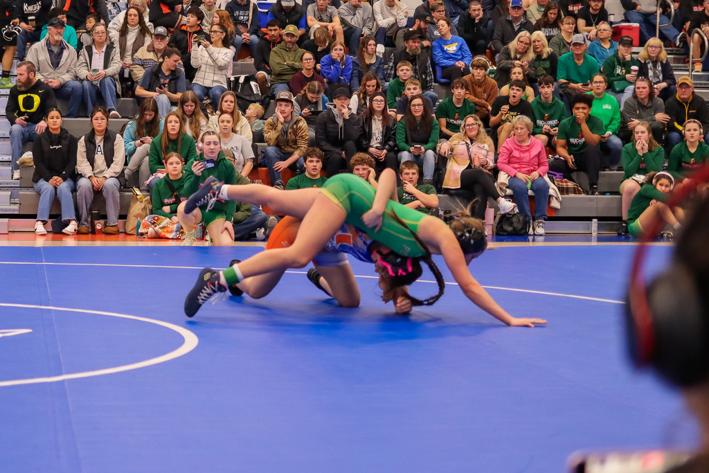 photo of athletes wrestling