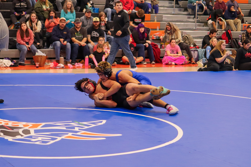 photo of athletes wrestling