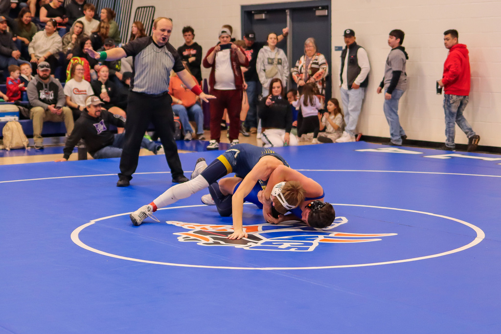 photo of athletes wrestling