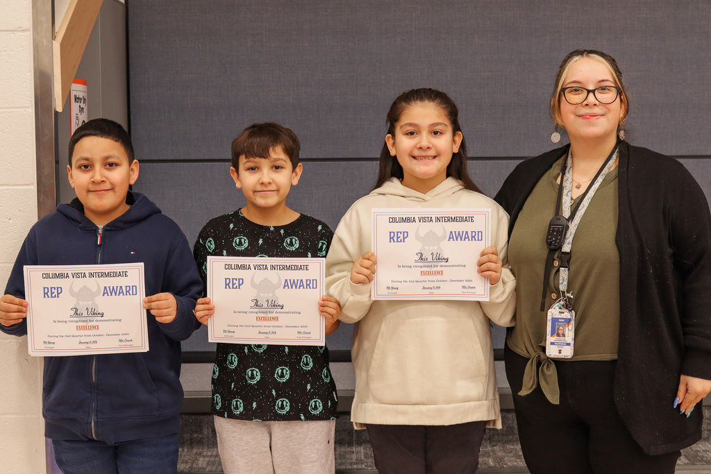 Photo of REP Award winners with their teacher