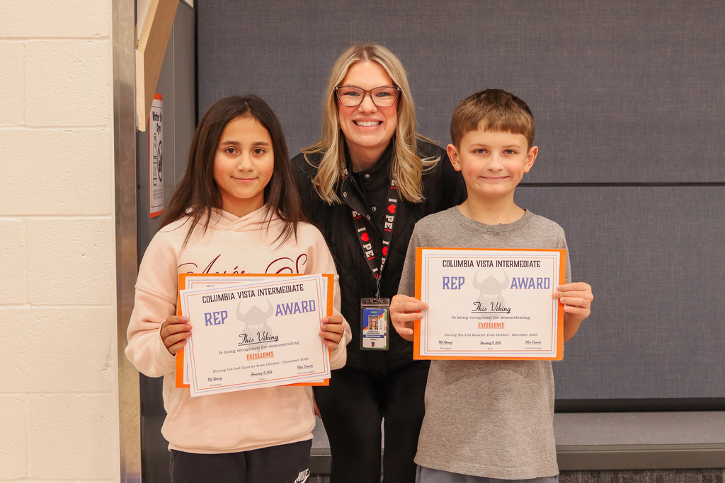 Photo of REP Award winners with their teacher