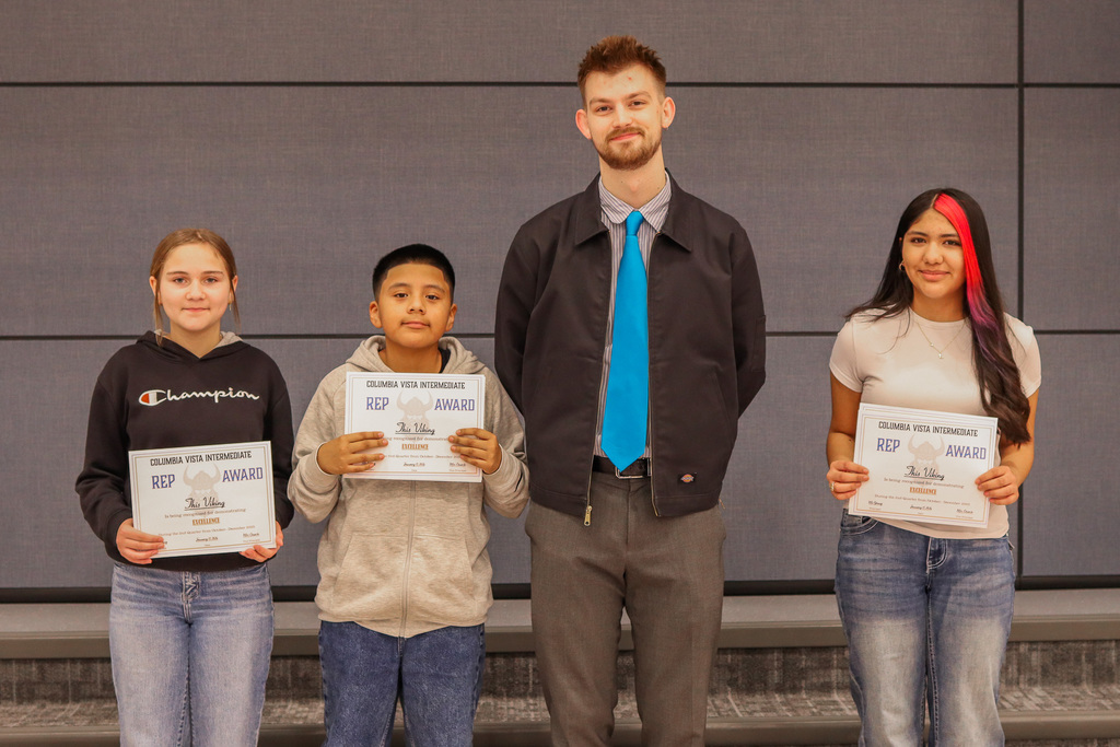 Photo of REP Award winners with their teacher