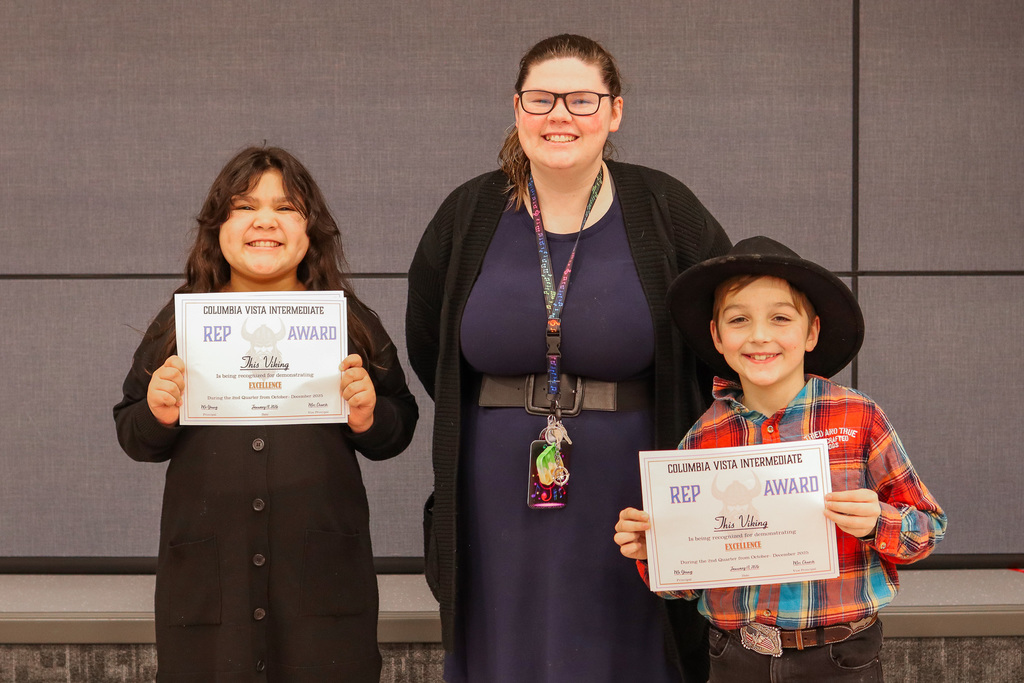 Photo of REP Award winners with their teacher