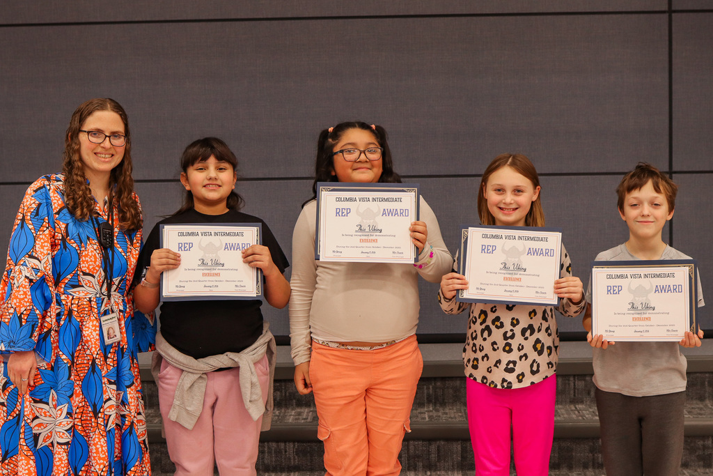 Photo of REP Award winners with their teacher