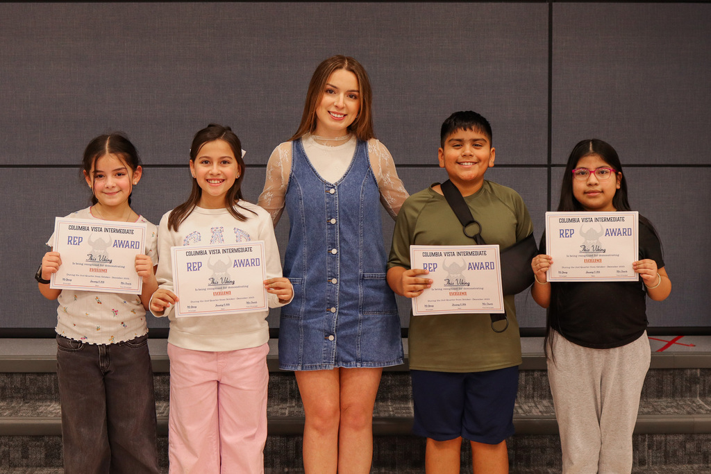 Photo of REP Award winners with their teacher