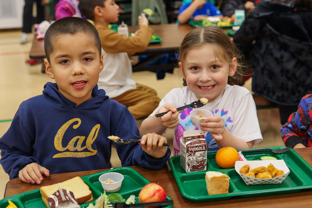 students trying peanut butter yogurt sample