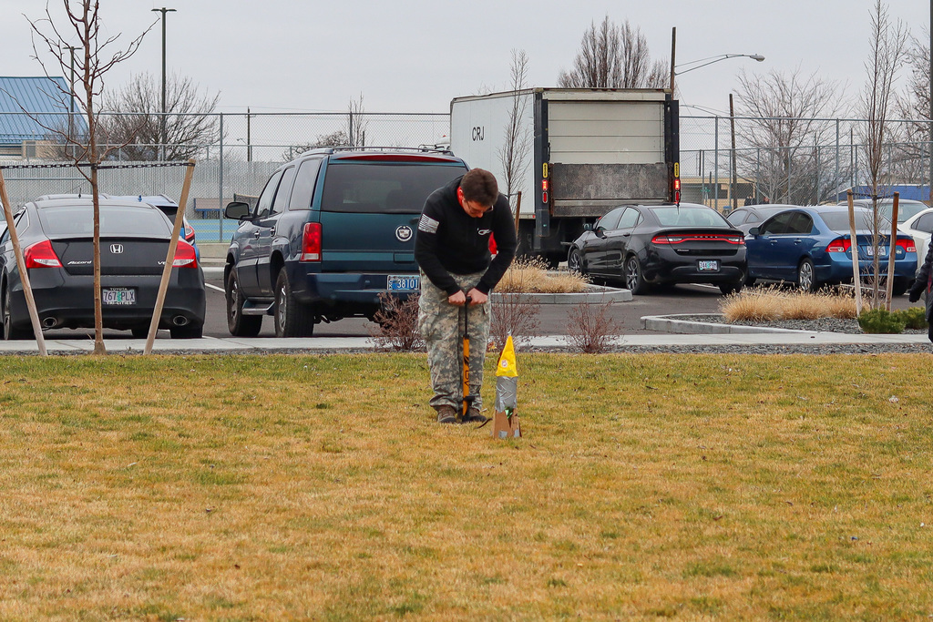 student preparing to launch rocket