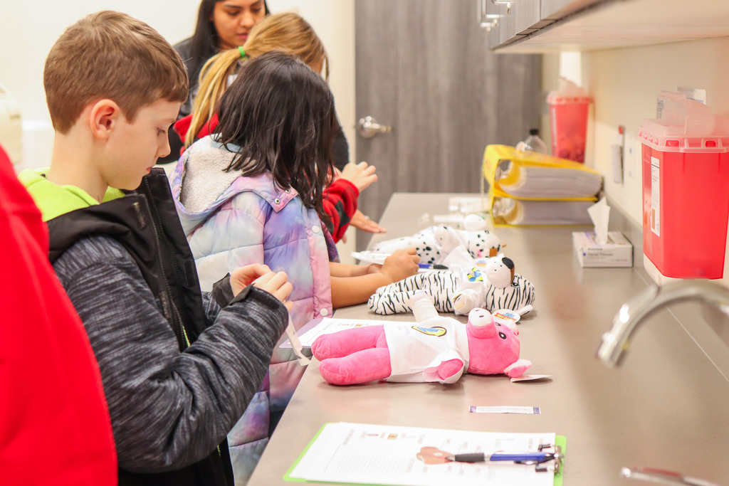 students learning about vaccinations