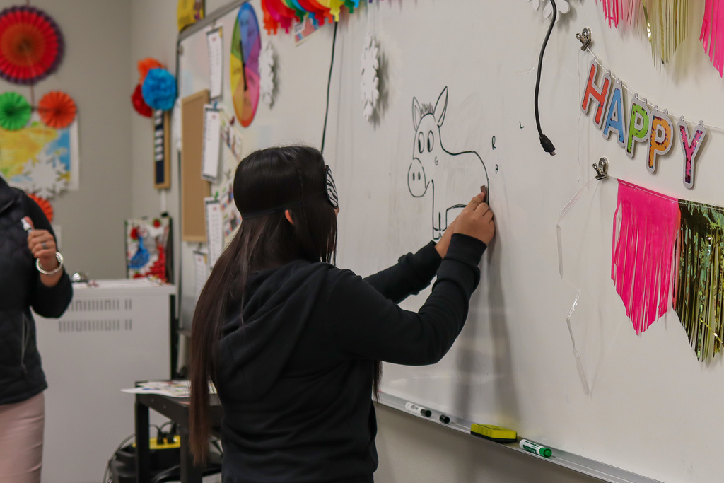 students playing pin the tail on the donkey 