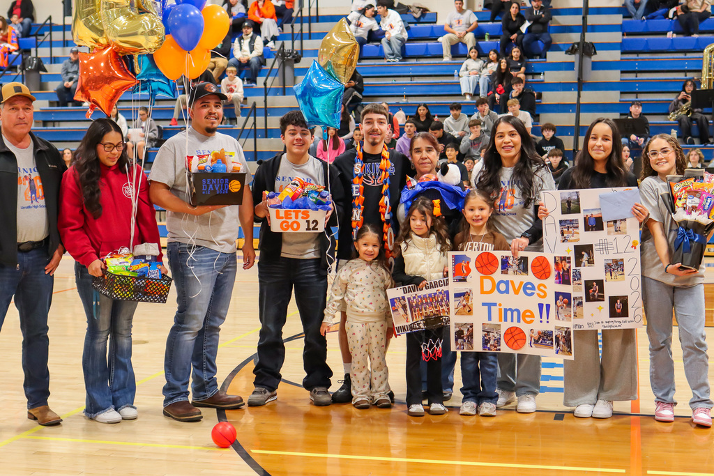 photo of basketball senior athlete with family