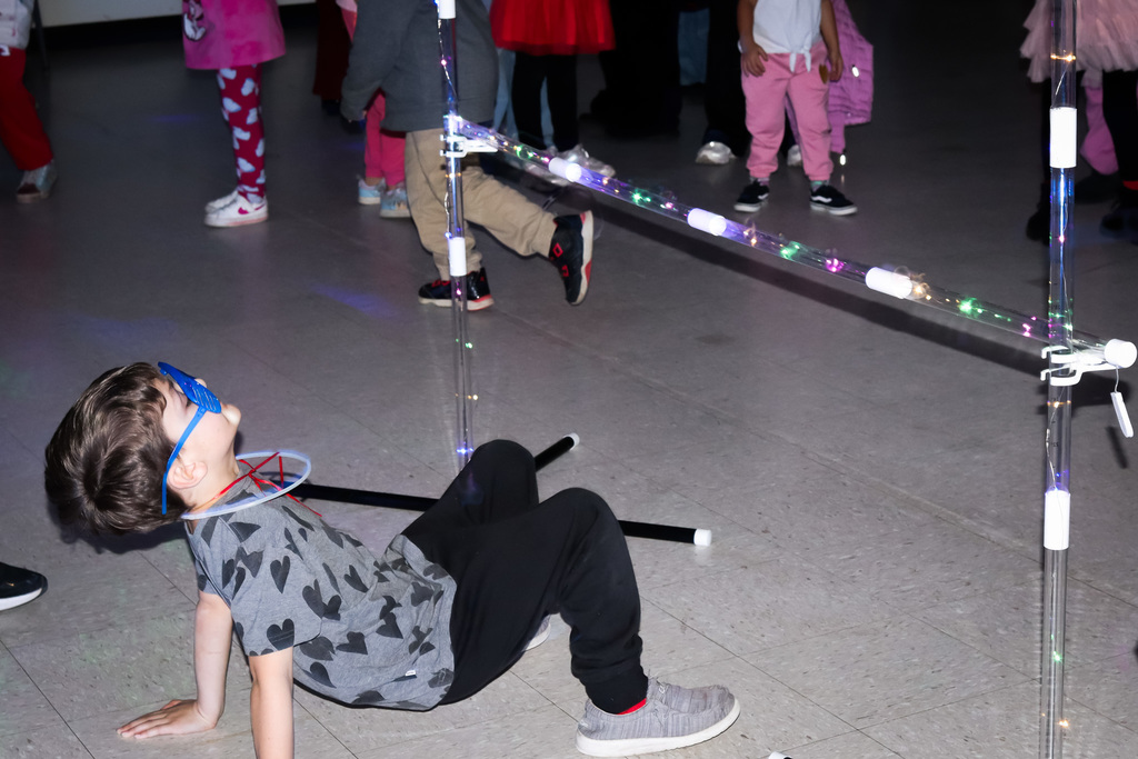 Student playing limbo 