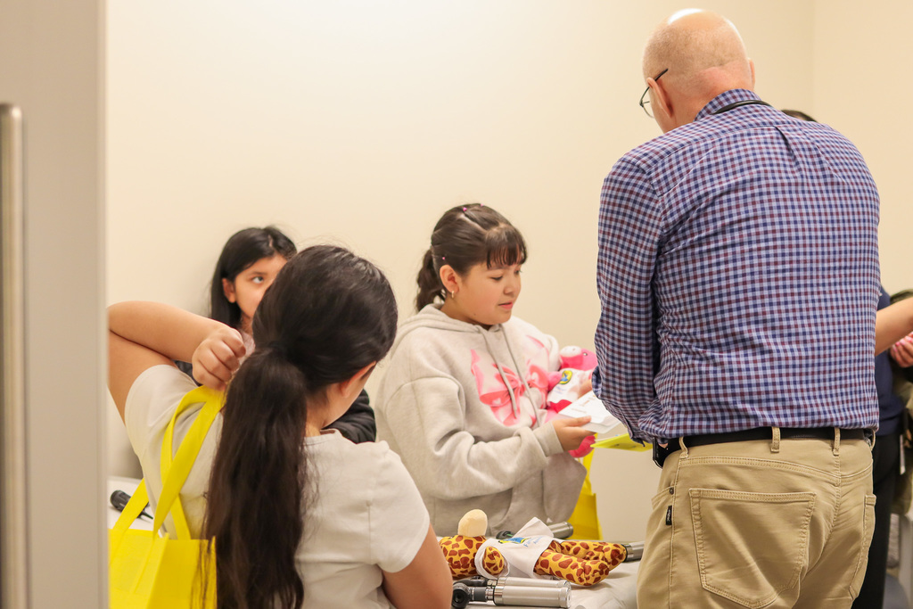 students performing an exam on their teddy bear buddy 