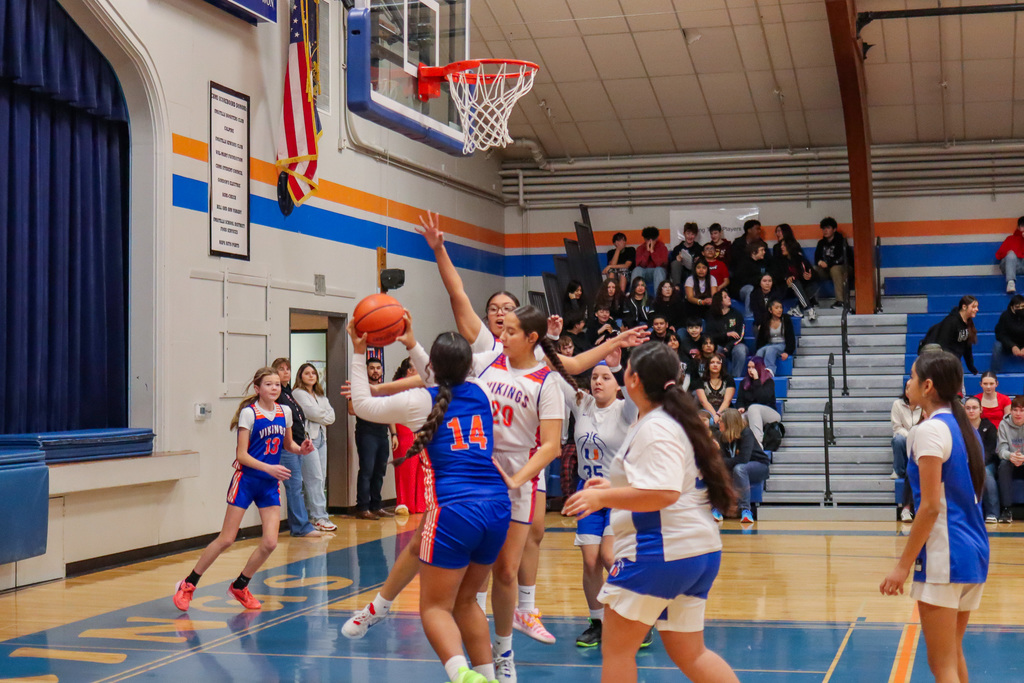 player number 14 going in for a lay up