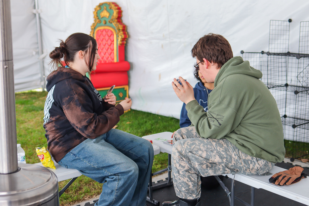 students playing cards while taking a snack break