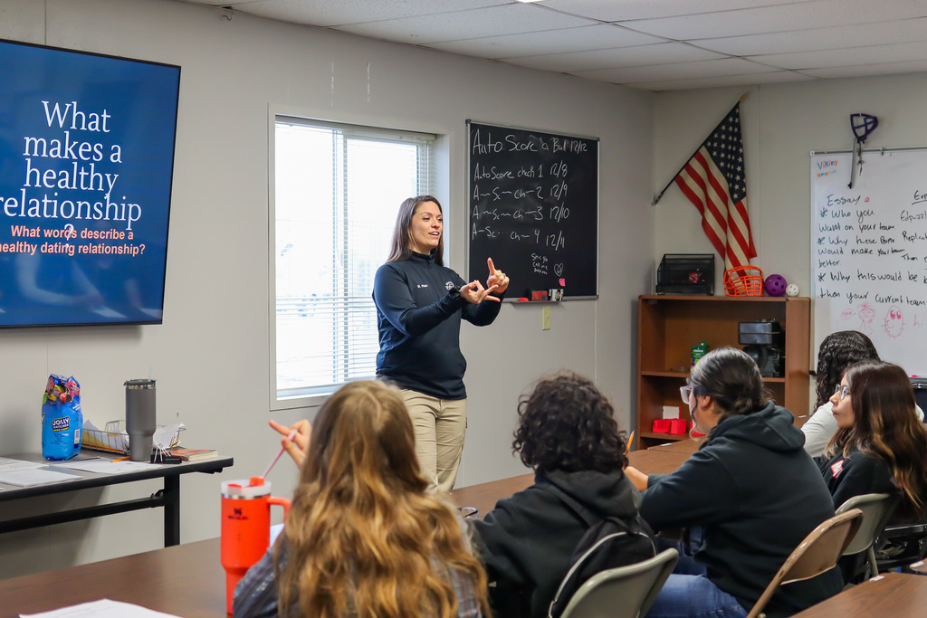 Michelle asking students what makes a healthy relationship