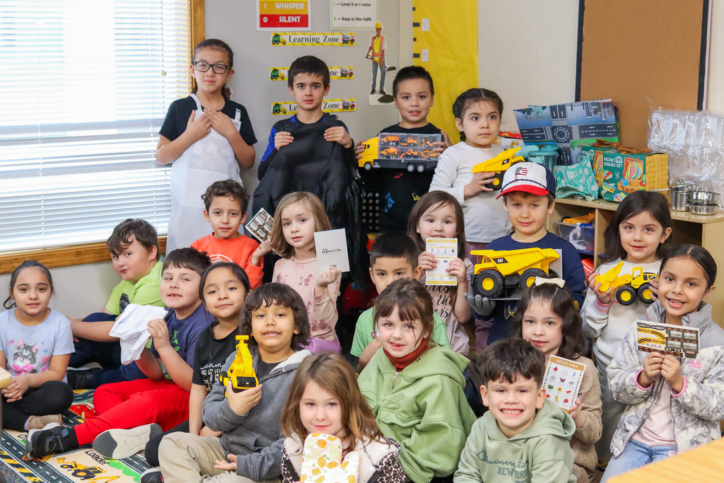kinder students holding supplies donated by Umatilla Parks and Recreation