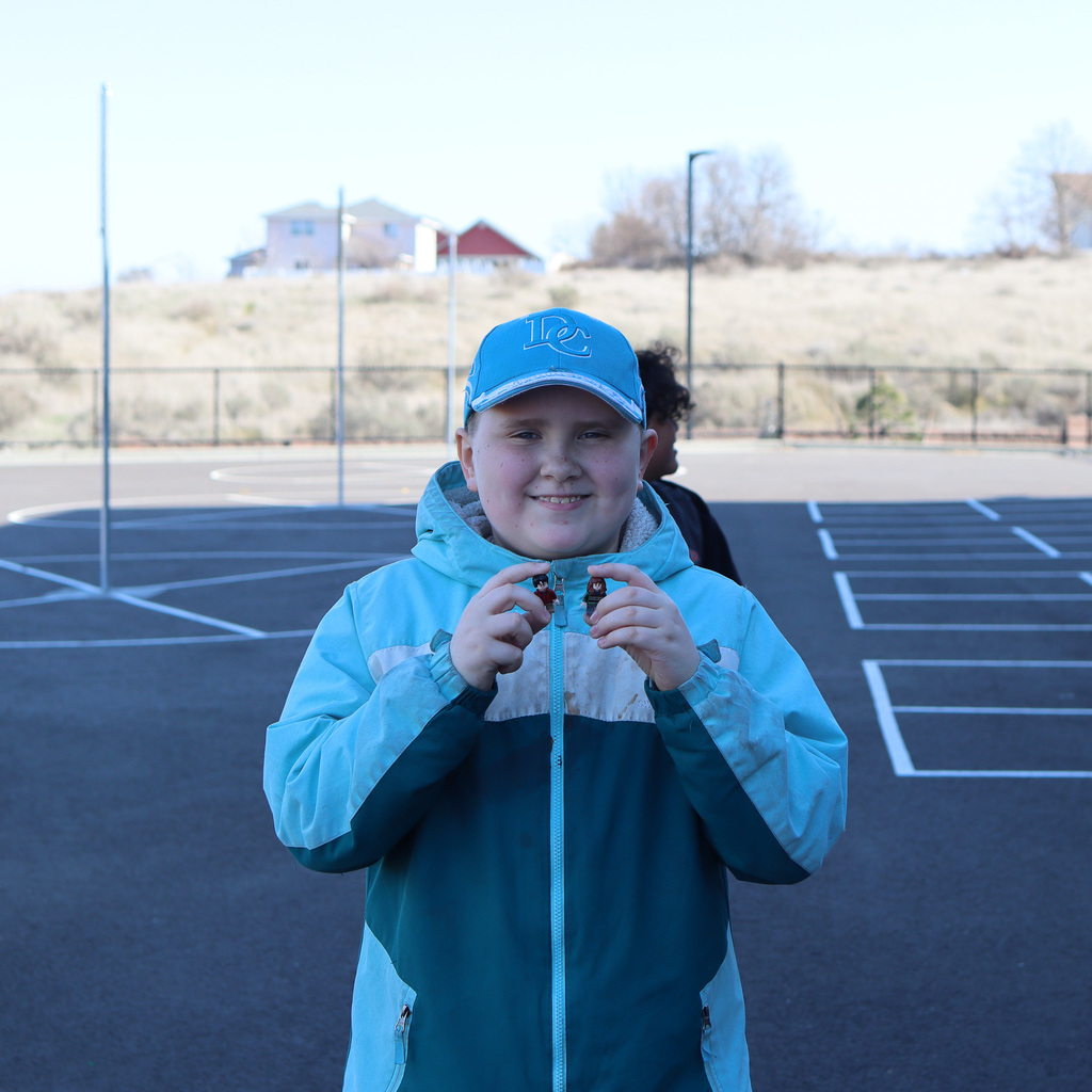 Students wearing a hat