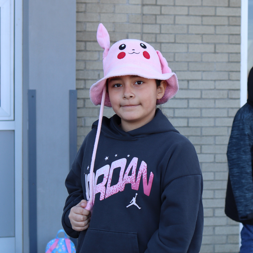 student wearing a hat