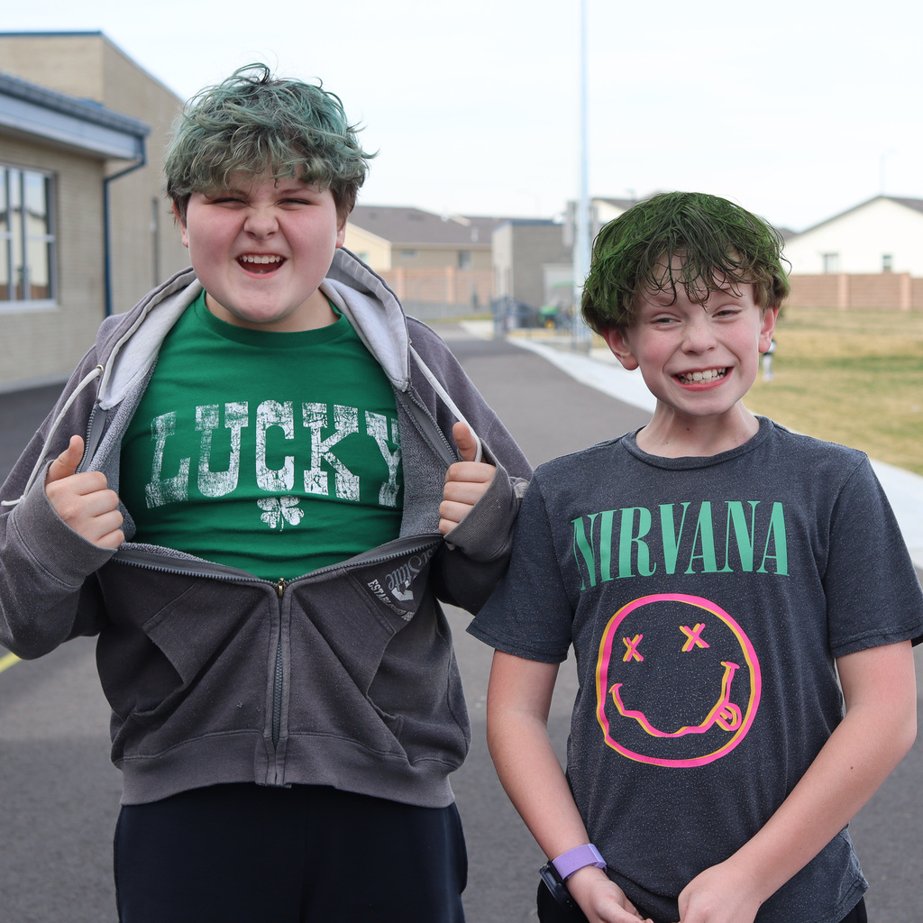 students wearing green